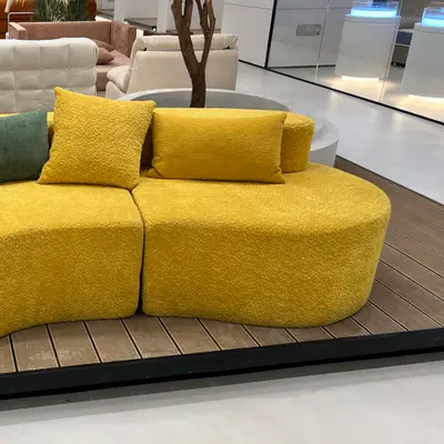 Sunburst Bouclé Curve Sofa angle 1